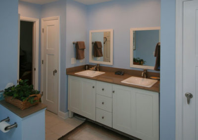 Updated bathroom vanity with added linen closets